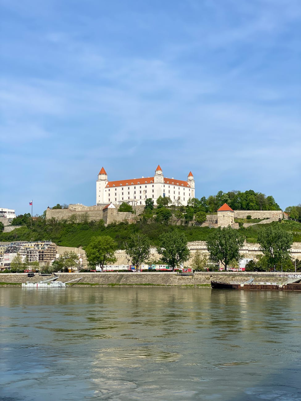 Stunning view of Bratislava Castle atop a hill along the Danube
