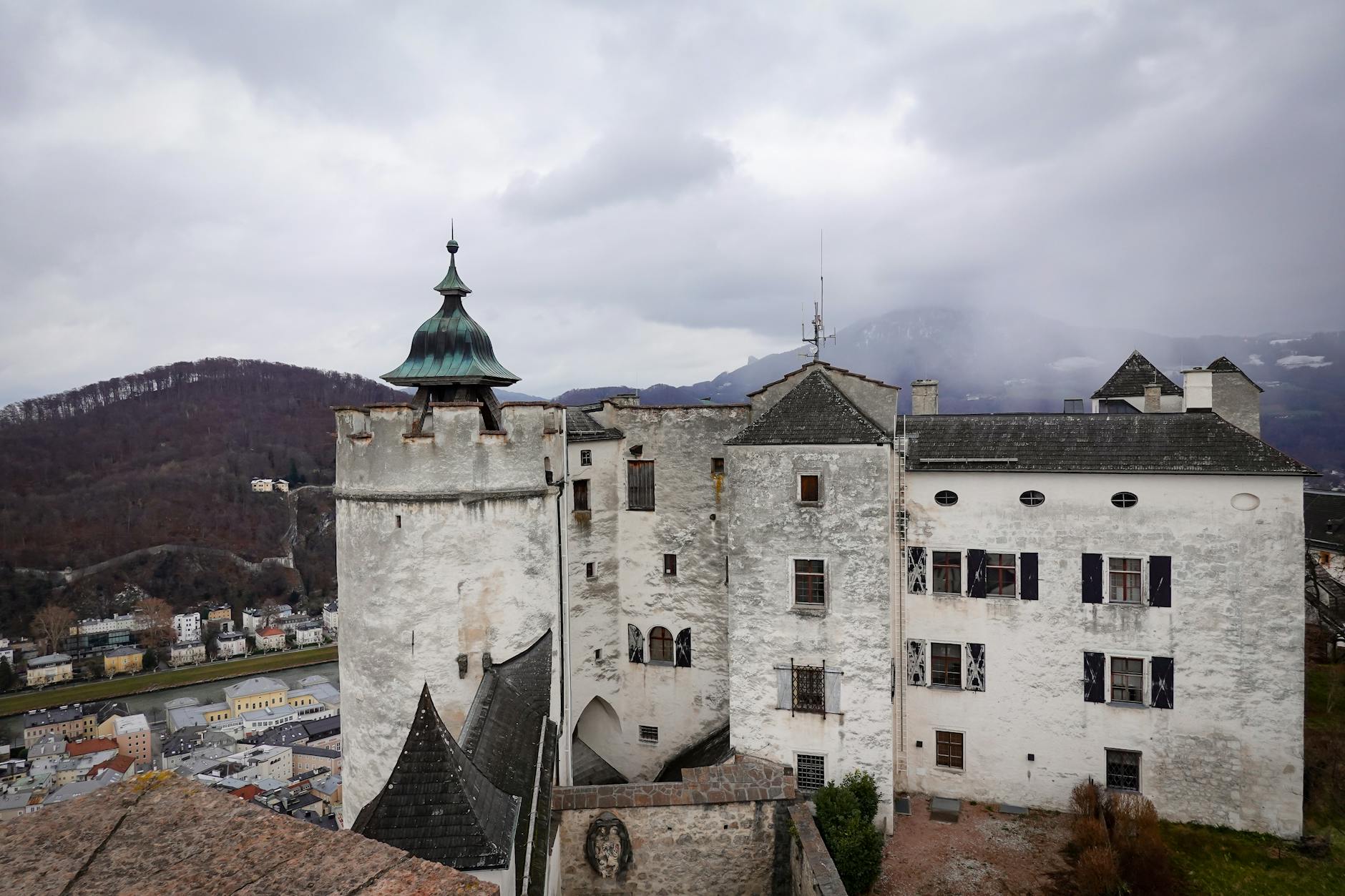 Medieval castle in Salzburg Austria against mountain backdrop