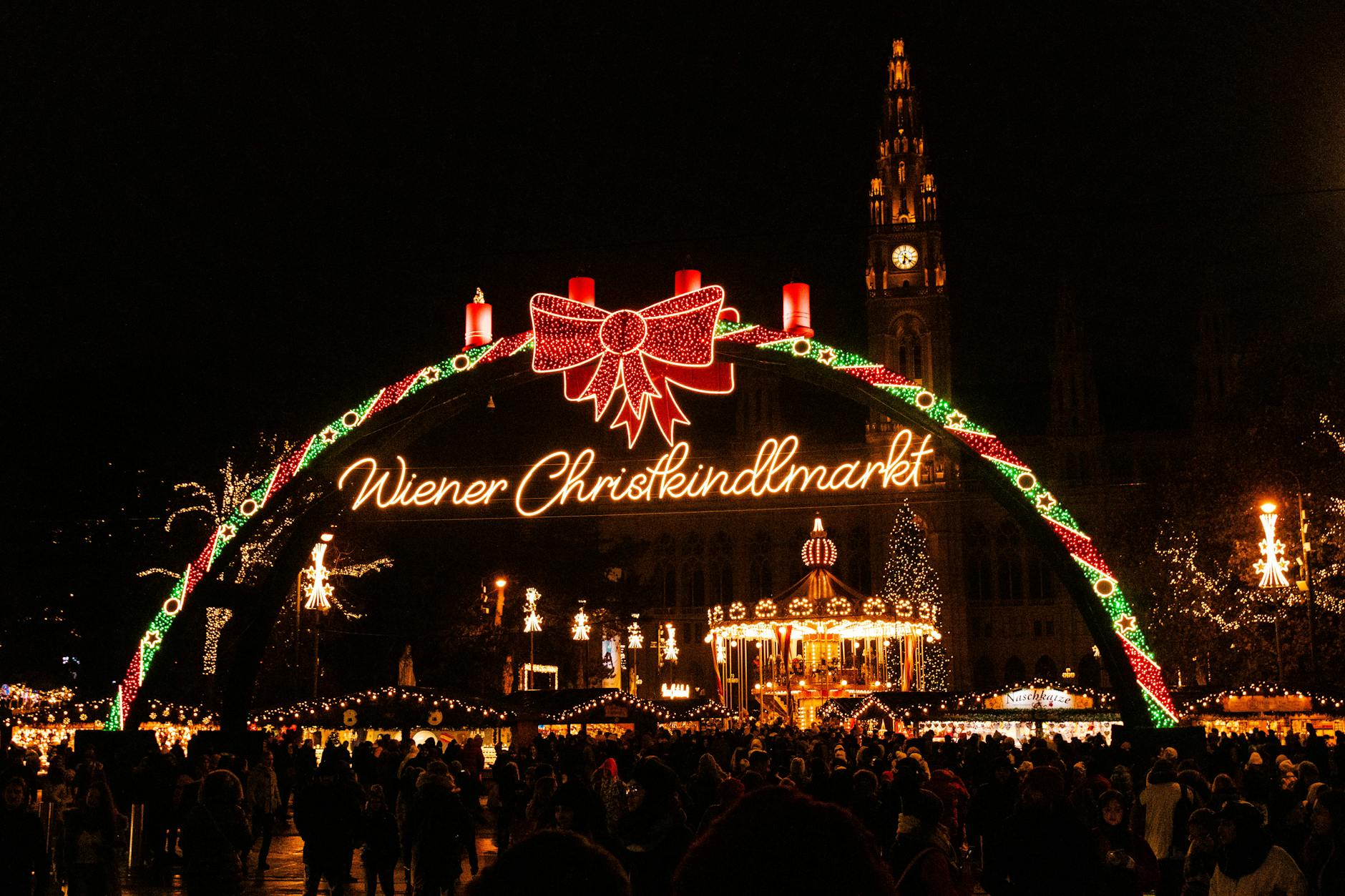 Festive atmosphere at Vienna's Christkindlmarkt Christmas market with twinkling lights