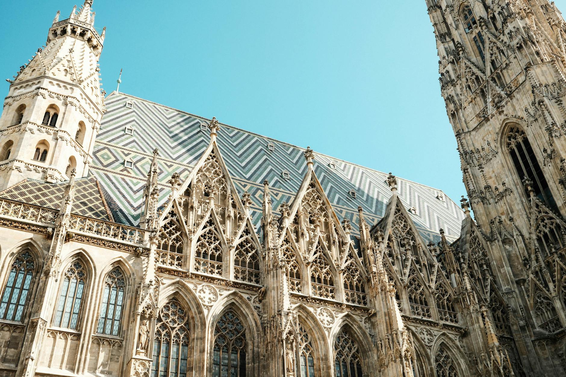 Detailed Gothic architecture of St. Stephen's Cathedral Stephansdom in Vienna under clear blue sky