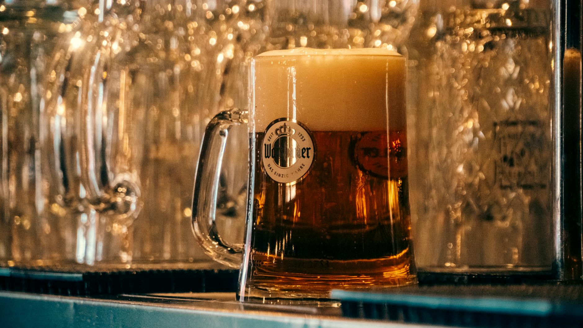 A small Pilsner is the local default pairing — no Champagne, just beer