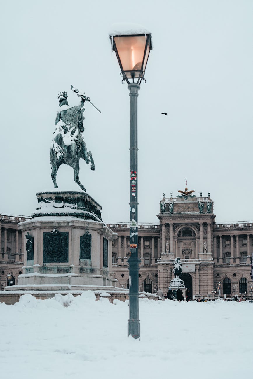 Winter scene of Heldenplatz in Vienna covered in snow