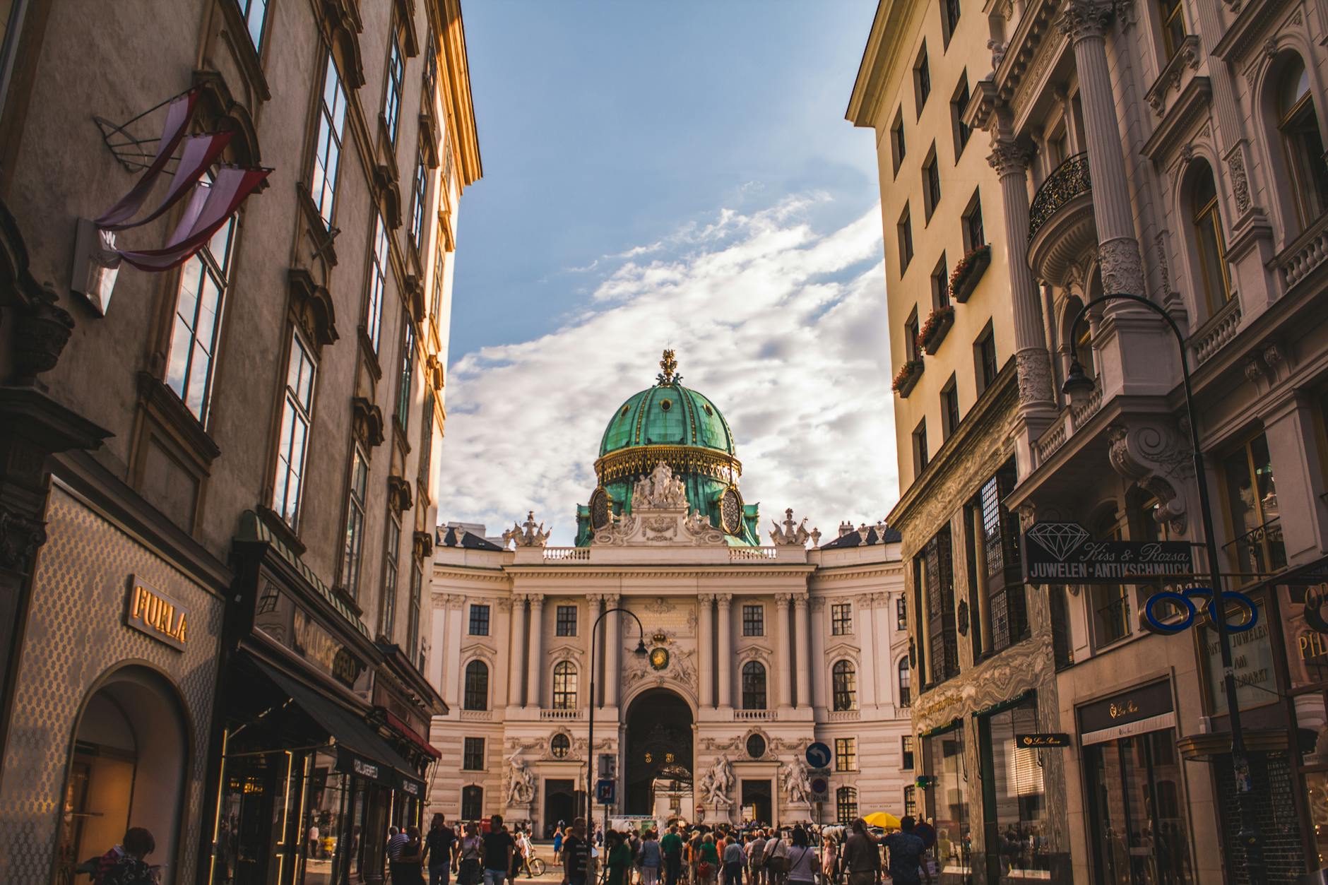 Bustling street scene leading to the Hofburg Palace in Vienna