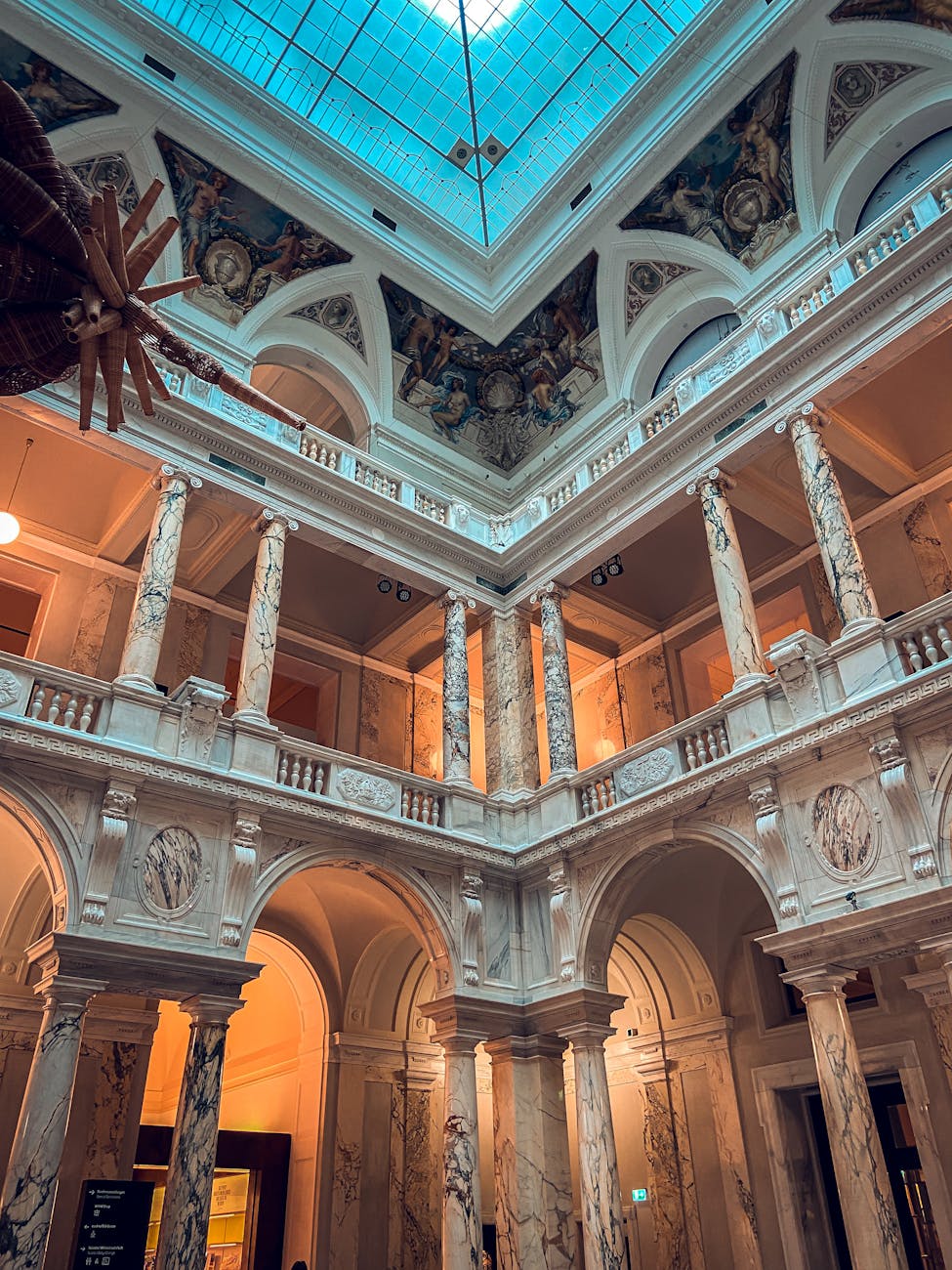 Intricate architecture and marble columns inside Vienna museum
