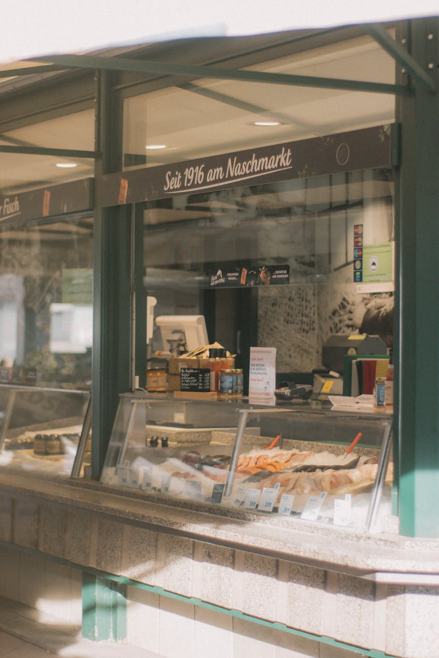 Historic Naschmarkt stall offering various goods in Vienna