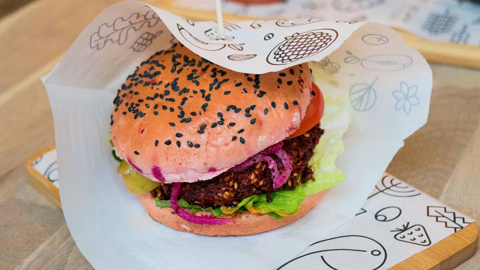 Swing Kitchen — Vienna's vegan burger chain, industrial-chic 1920s swing-era design