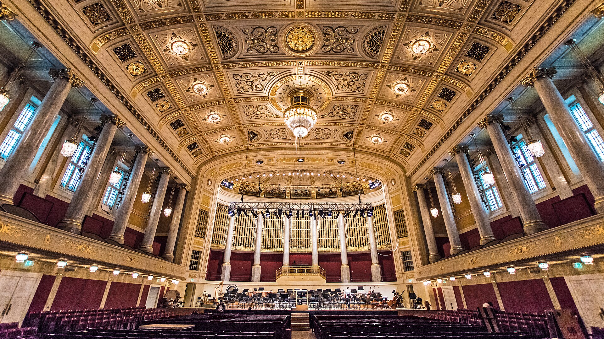 The Grosser Saal of the Wiener Konzerthaus from the rear stalls, with marble columns, a coffered ceiling and the organ above an empty stage set with music stands